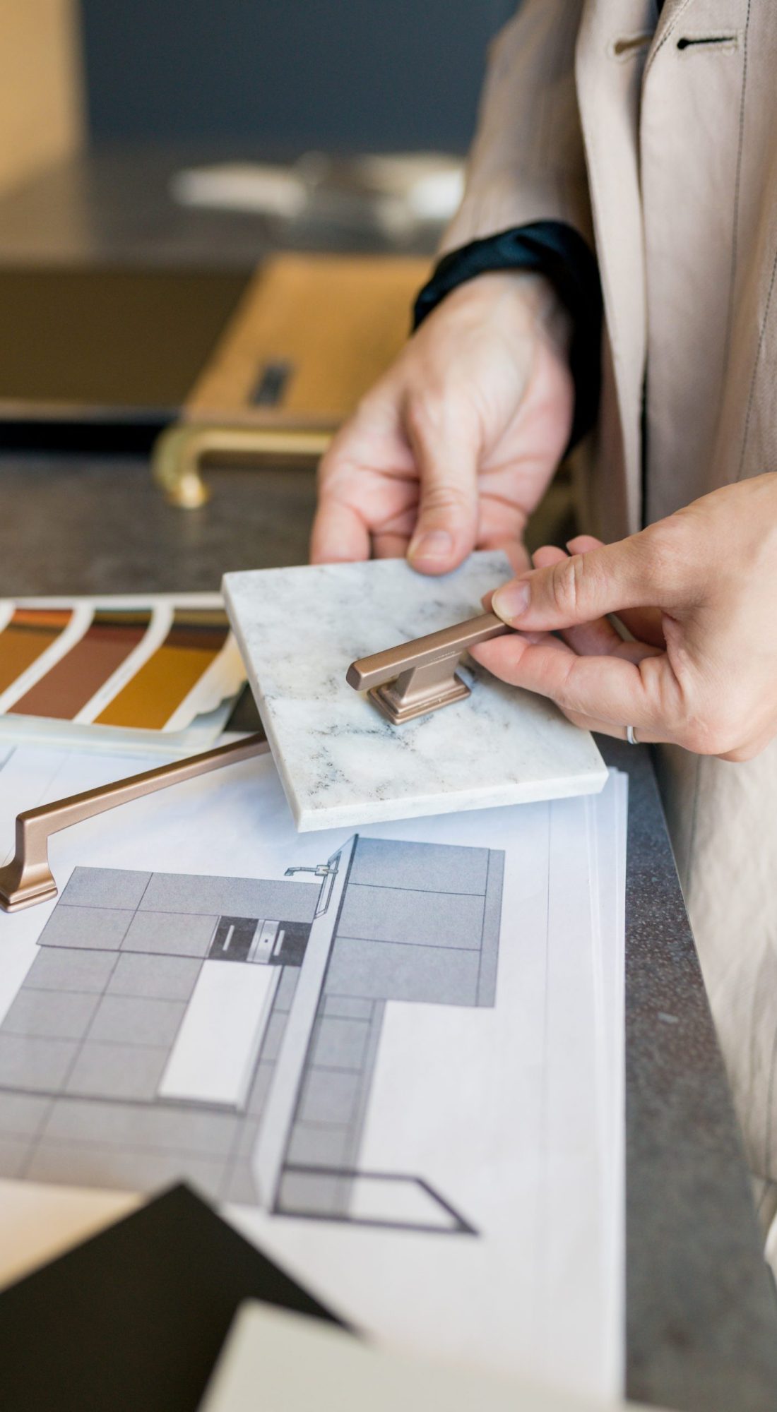 Close,Up,Of,Designer,Woman,Choosing,Details,Of,New,Kitchen